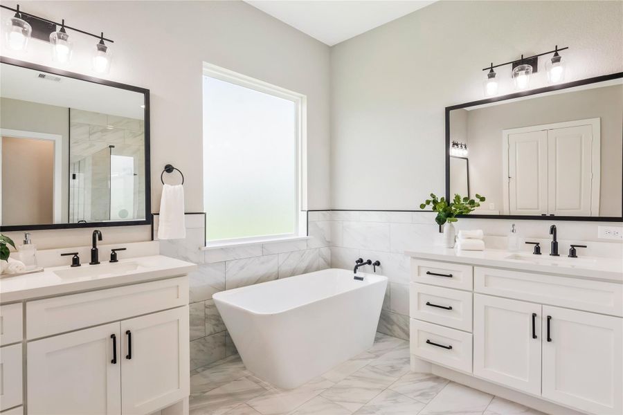 So much natural light, and stand-alone bathtub So much natural light, and stand-alone bathtub