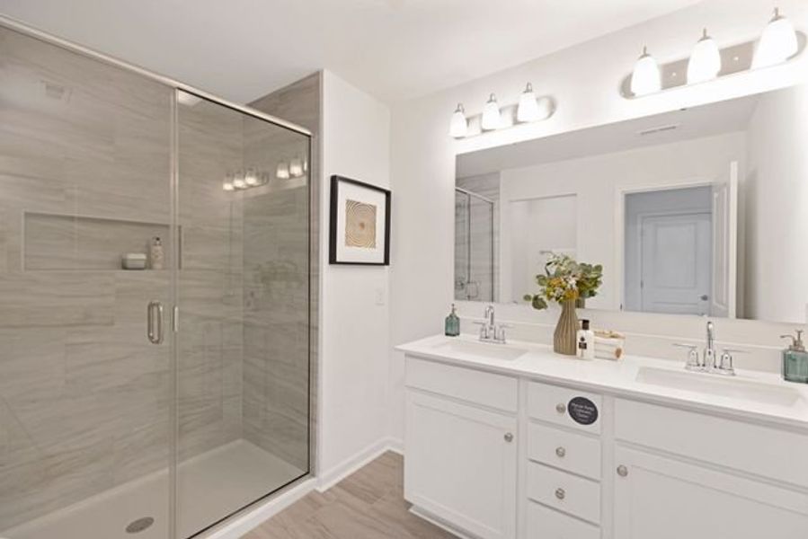 Representative furnished interior of a home built from the Alexandria TH by True Homes in Covington Ridge Townhomes, Thomasville (Image 15).