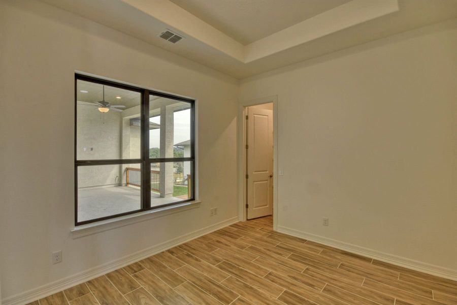 Spacious, unfurnished interior of a new home in El Sonido at Campanas, San Antonio (Image 30).