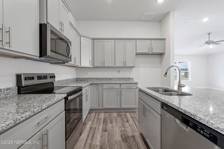 Furnished interior view inside a new home in Shadow Crest at Rolling Hills, Green Cove Springs (Image 6).