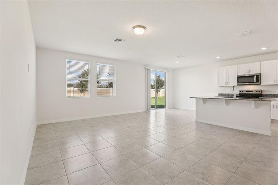 Spacious, unfurnished interior of a new home in Lawson Dunes - Signature Series, Haines City (Image 34).