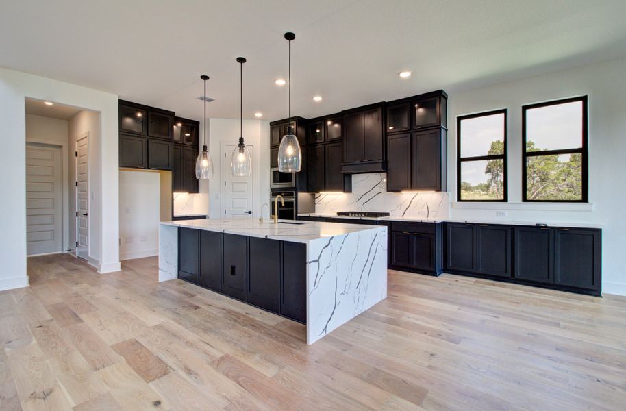 Representative furnished interior of a home built from the Signature Series - Partridge by DRB Homes in Oaks at San Gabriel, Georgetown (Image 4). Representative furnished interior of a home built from the Signature Series - Partridge by DRB Homes in Oaks at San Gabriel, Georgetown (Image 4).