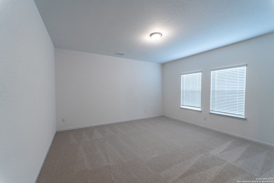 Spacious, unfurnished interior of a new home in Mesa Vista, Von Ormy (Image 13).