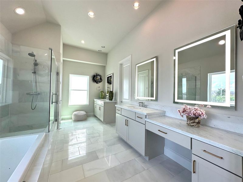 Greet the day in the natural light of this primary bathrooom!