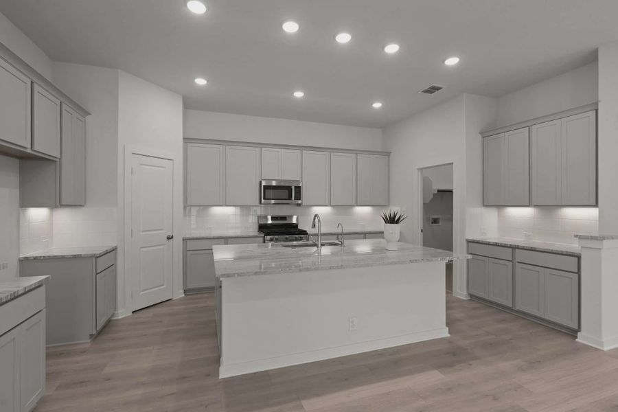 Representative furnished interior of a home built from the Tanner by Chesmar Homes in The Crossvine, Forney (Image 8).