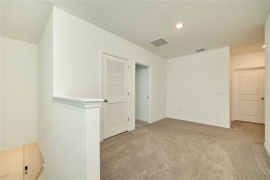 Spacious, unfurnished interior of a new home in Westgate at Avalon Park, Wesley Chapel (Image 42).