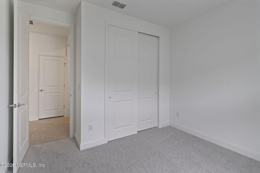 Spacious, unfurnished interior of a new home in Tributary, Yulee (Image 15). Spacious, unfurnished interior of a new home in Tributary, Yulee (Image 15).