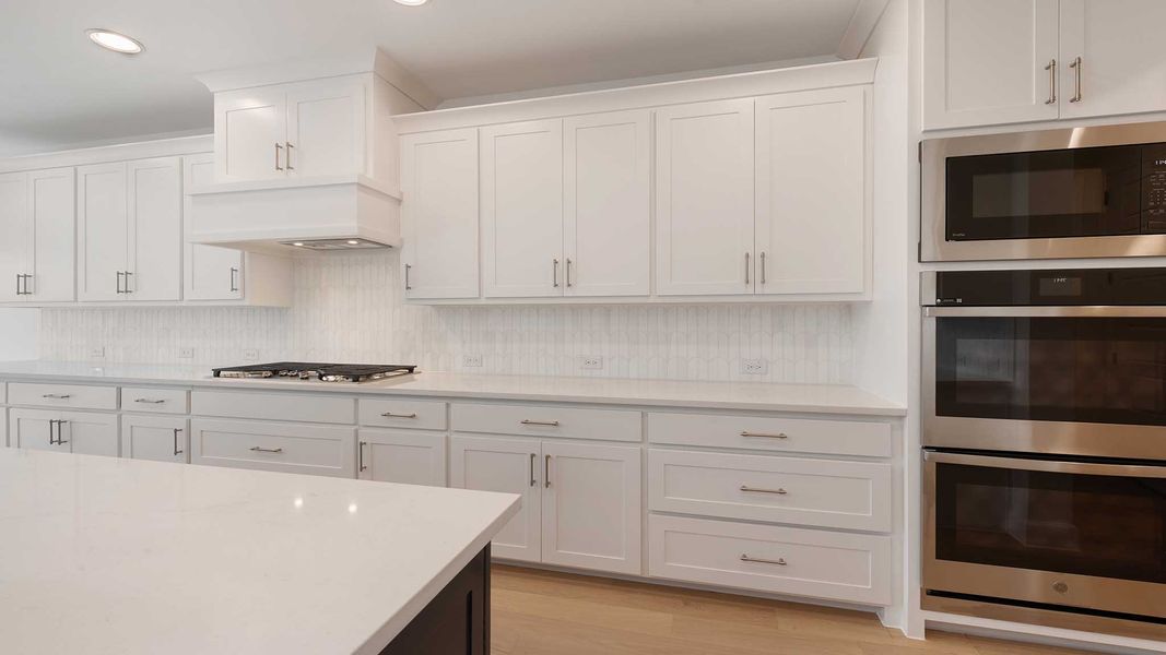 Representative furnished interior of a home built from the 3978W by Perry Homes in Austin Point, Richmond (Image 5).