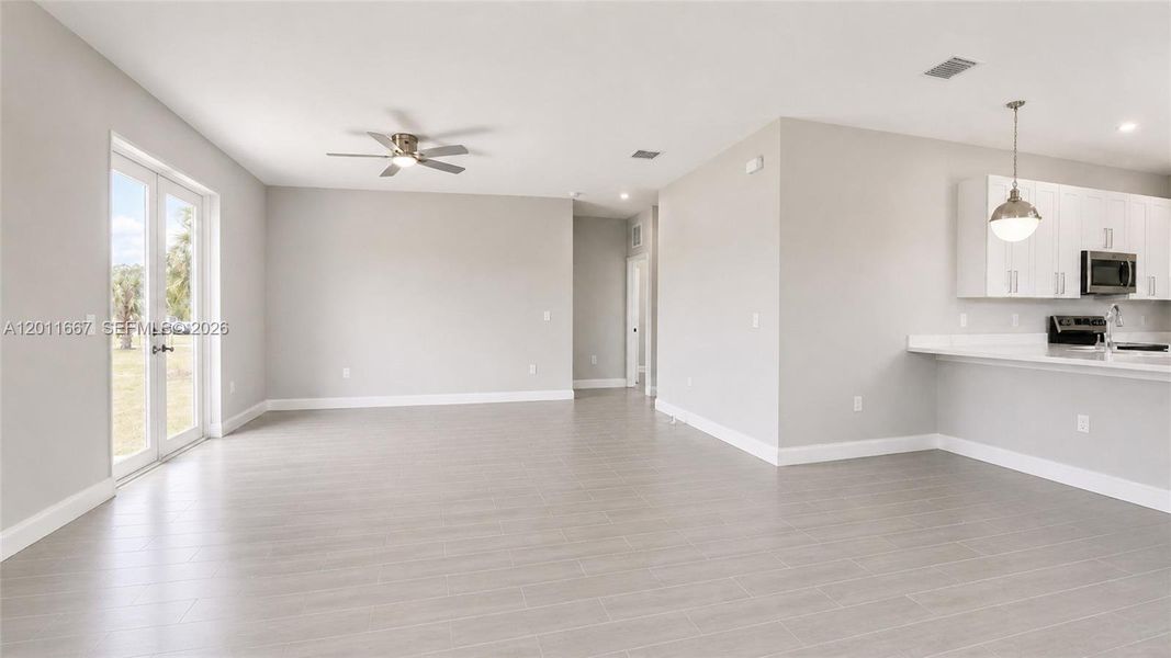 Spacious, unfurnished interior of a new home in , Lehigh Acres (Image 19). Spacious, unfurnished interior of a new home in , Lehigh Acres (Image 19).
