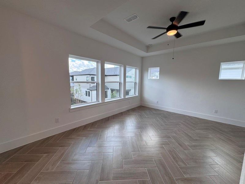 Spacious, unfurnished interior of a new home in Easthaven at Bridgeland Central - Vision Collection, Cypress (Image 18).