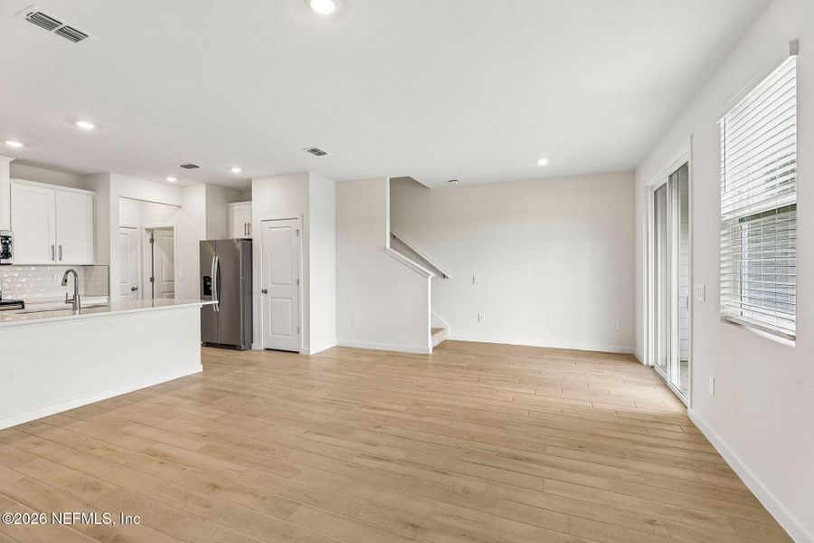 Spacious, unfurnished interior of a new home in The District at Oakleaf - The Grove, Middleburg (Image 12).