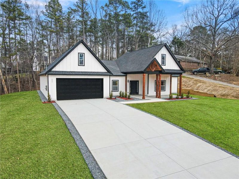 Front exterior of a new home in , Cartersville, GA, highlighting curb appeal (Image 26).