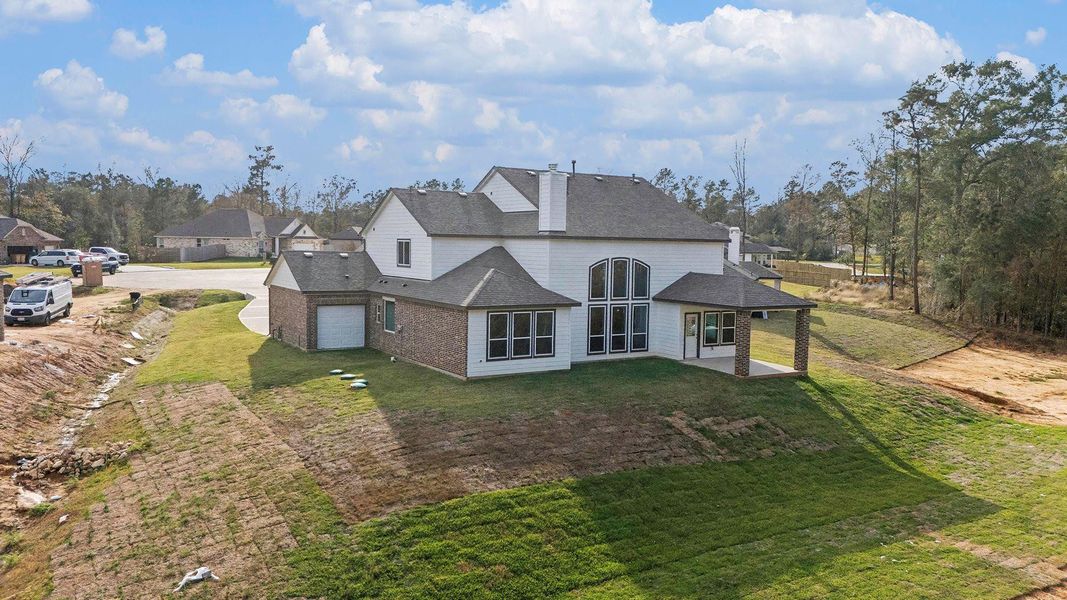 Exterior details and patio area of a home in Oakwood Ranch, Willis (Image 4).