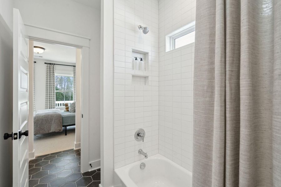 Furnished interior view inside a new home in Tidewater at Lakes of Cane Bay, Summerville (Image 58).