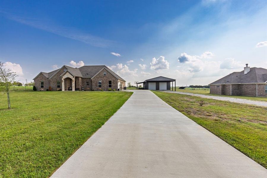 Front exterior of a new home in , Leonard, TX, highlighting curb appeal (Image 1).