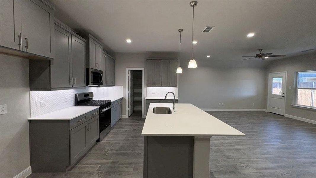 Kitchen - All Home and community information, including pricing, included features, terms, availability and amenities, are subject to change at any time without notice or obligation. All Drawings, pictures, photographs, video, square footages, floor plans, elevations, features, colors and sizes are approximate for illustration purposes only and will vary from the homes as built.