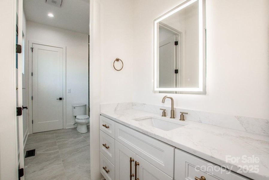 Furnished interior view inside a new home in , Statesville (Image 7).