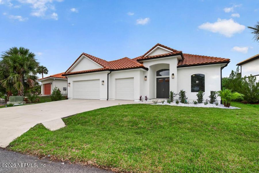 Front exterior of a new home in , St. Johns, FL, highlighting curb appeal (Image 36).