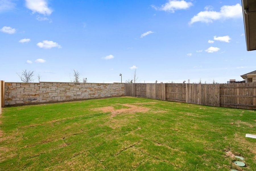 Exterior details and patio area of a home in Flora, Hutto (Image 23).