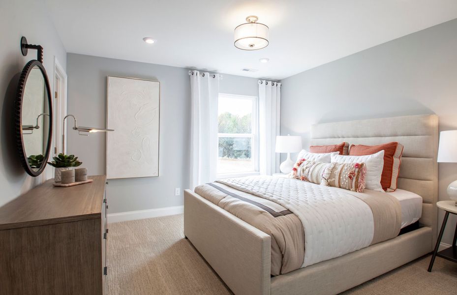 Bedroom 2 features a walk-in closet and plenty of