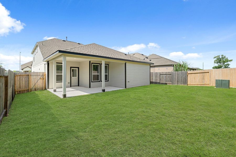 Front exterior of a new home in Grand Oaks – The Cove, Houston, TX, highlighting curb appeal (Image 2). Front exterior of a new home in Grand Oaks – The Cove, Houston, TX, highlighting curb appeal (Image 2).