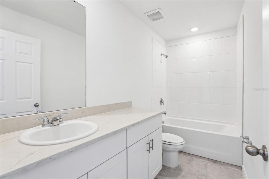 Furnished interior view inside a new home in Lake Deer Estates - Signature Series, Poinciana (Image 7). Furnished interior view inside a new home in Lake Deer Estates - Signature Series, Poinciana (Image 7).