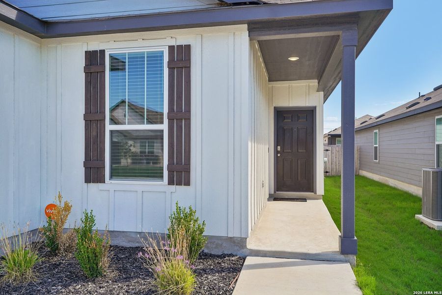 Exterior details and patio area of a home in Dove Song, Marion (Image 21).