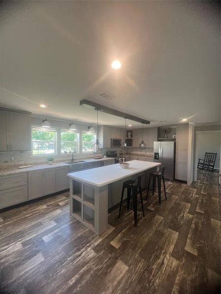 Furnished interior view inside a new home in , Pelican Bay (Image 4).