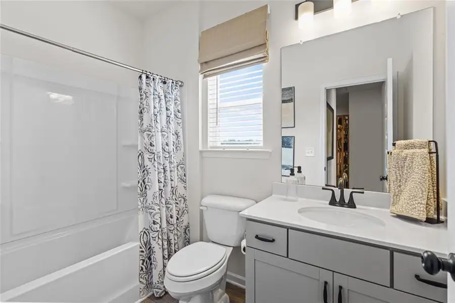 Furnished interior view inside a new home in Trinity Station, Auburn (Image 27).