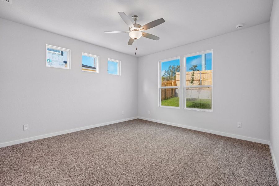 Spacious, unfurnished interior of a new home in The Meadows at Hunters Ranch, San Antonio (Image 29).