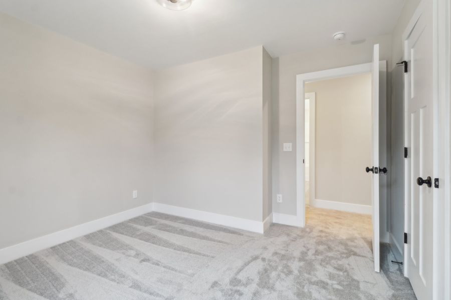 Representative unfurnished interior of a home built from the Ashbourne II by Great Southern Homes in Collins Cove, Chapin (Image 44).