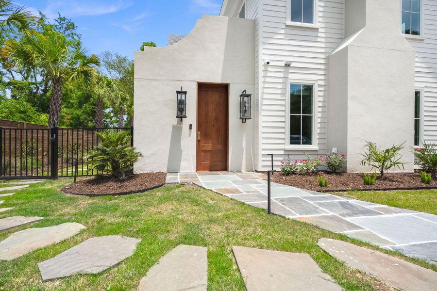 Exterior details and patio area of a home in , Johns Island (Image 42).