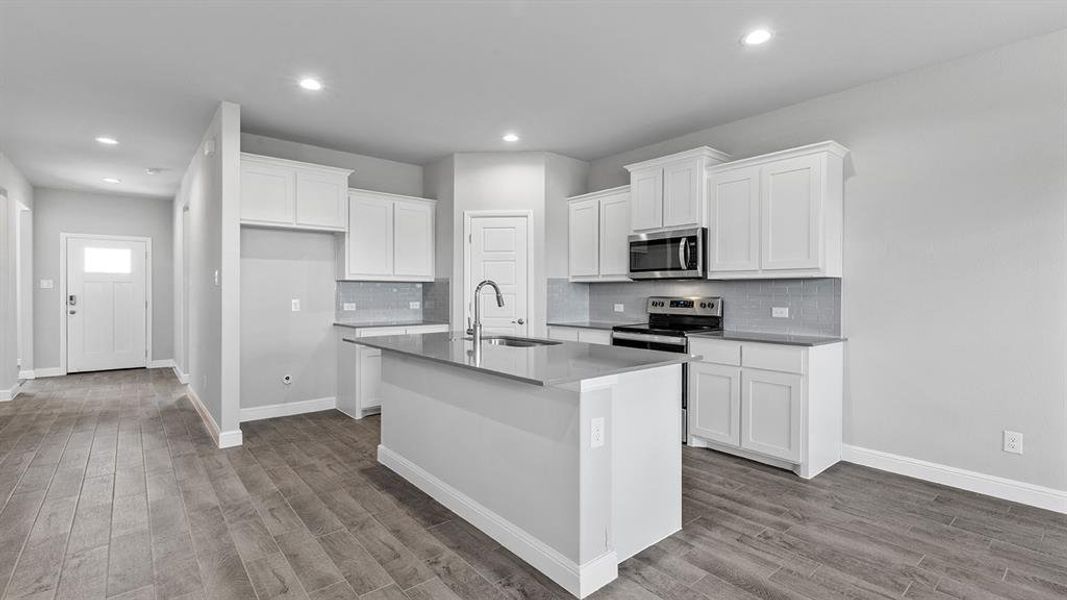 Kitchen - All Home and community information, including pricing, included features, terms, availability and amenities, are subject to change at any time without notice or obligation. All Drawings, pictures, photographs, video, square footages, floor plans, elevations, features, colors and sizes are approximate for illustration purposes only and will vary from the homes as built.