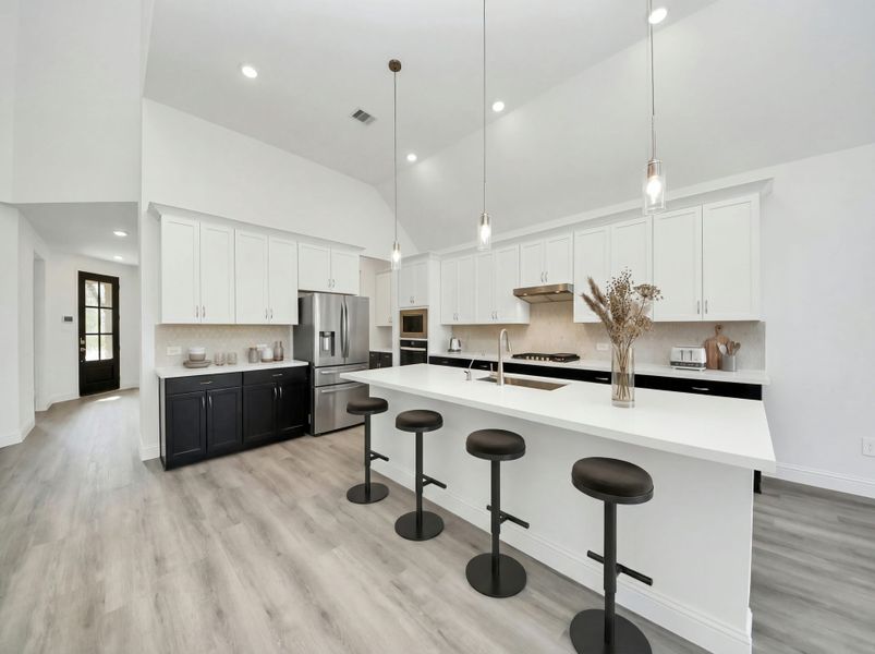 Furnished interior view inside a new home in ARTAVIA, Conroe (Image 6).