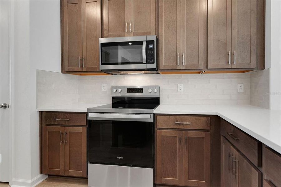 Furnished interior view inside a new home in Crossroads at Kelly Park, Apopka (Image 13).