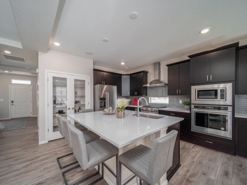 Furnished interior view inside a new home in The Reserve at Green Valley Ranch, Aurora (Image 6).