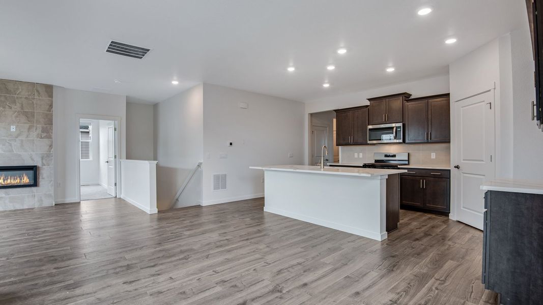 Furnished interior view inside a new home in Trails at Crowfoot, Parker (Image 8).