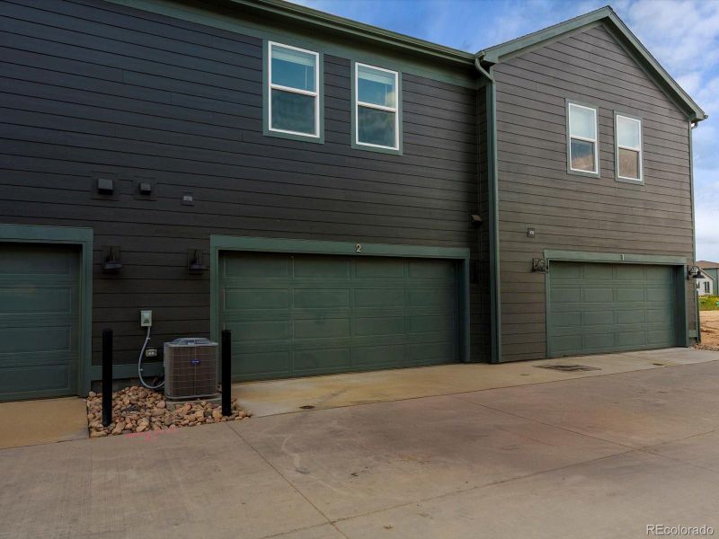 Exterior details and patio area of a home in Poudre Heights: The Meadow Collection, Windsor (Image 1).