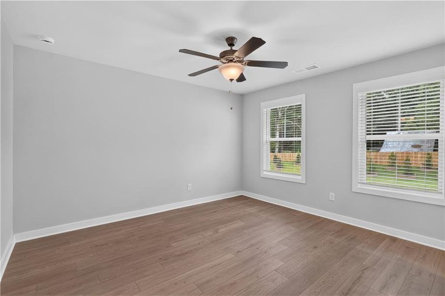 Spacious, unfurnished interior of a new home in The Cottages at East Lanier, Fayetteville (Image 12).