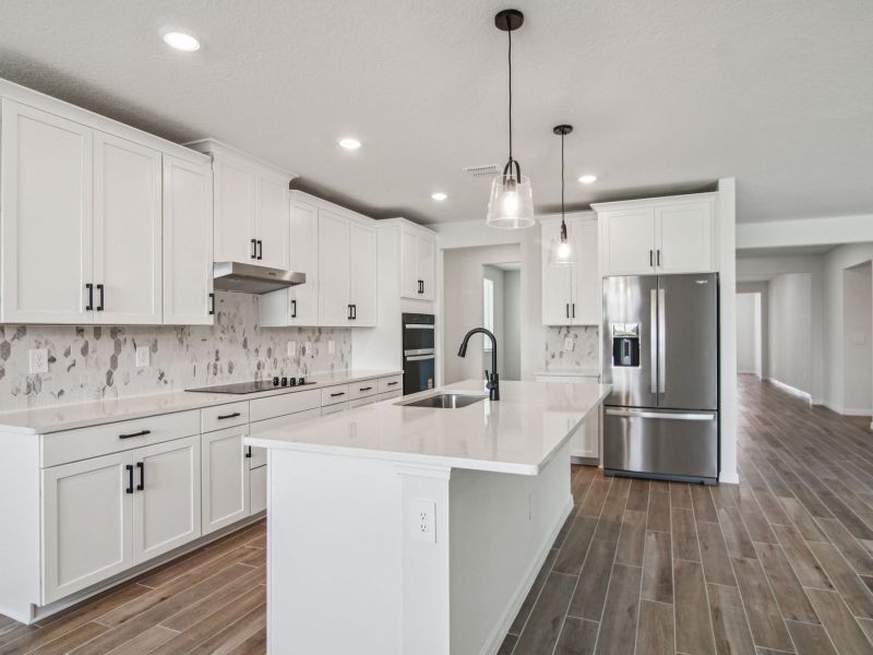 Furnished interior view inside a new home in Oakfield Trails - Signature Series, Parrish (Image 3). Furnished interior view inside a new home in Oakfield Trails - Signature Series, Parrish (Image 3).