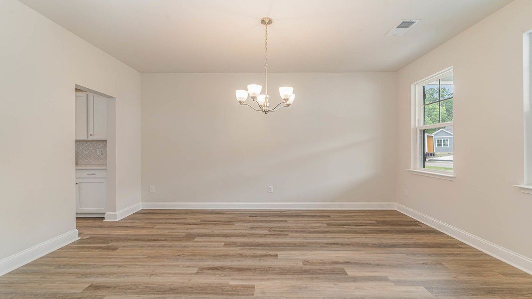 Representative unfurnished interior of a home built from the FORRESTER by D.R. Horton in Shell Pointe, Gilbert (Image 15).