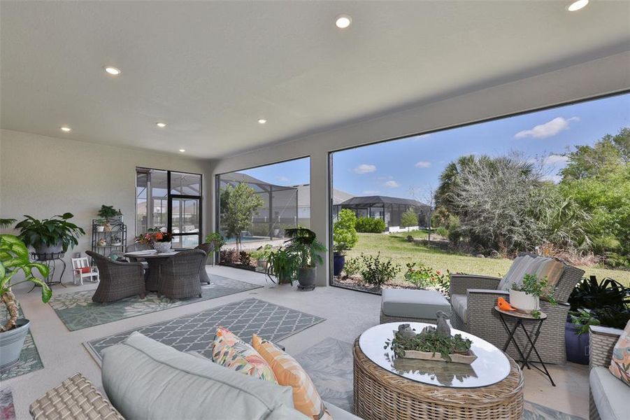 Exterior details and patio area of a home in Esplanade at Artisan Lakes, Palmetto (Image 25).