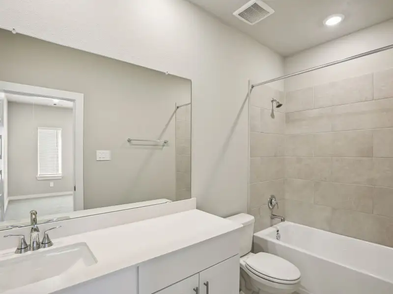 Furnished interior view inside a new home in Pinewood Trails - City Series, Atascocita (Image 7).
