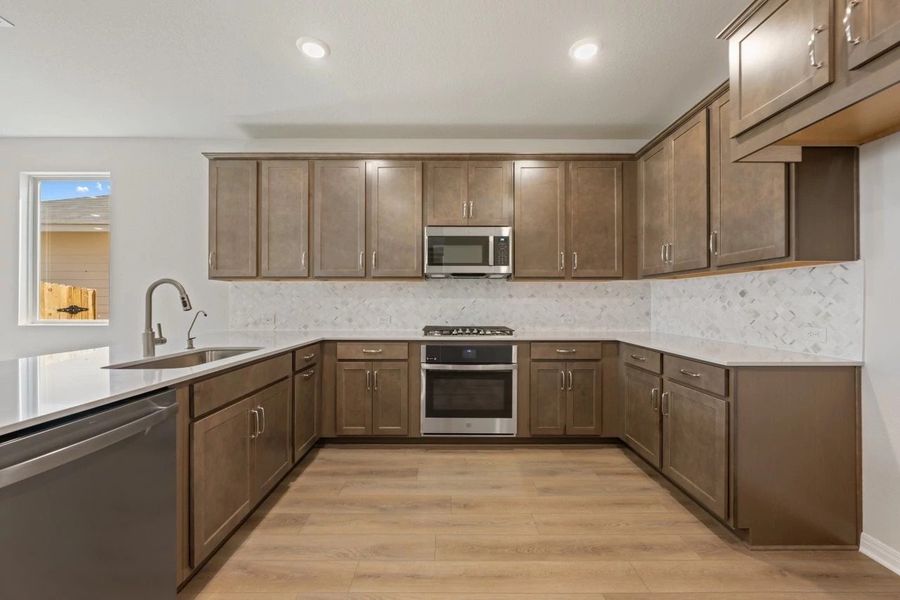 Furnished interior view inside a new home in Rolling Glen, Hutto (Image 6).