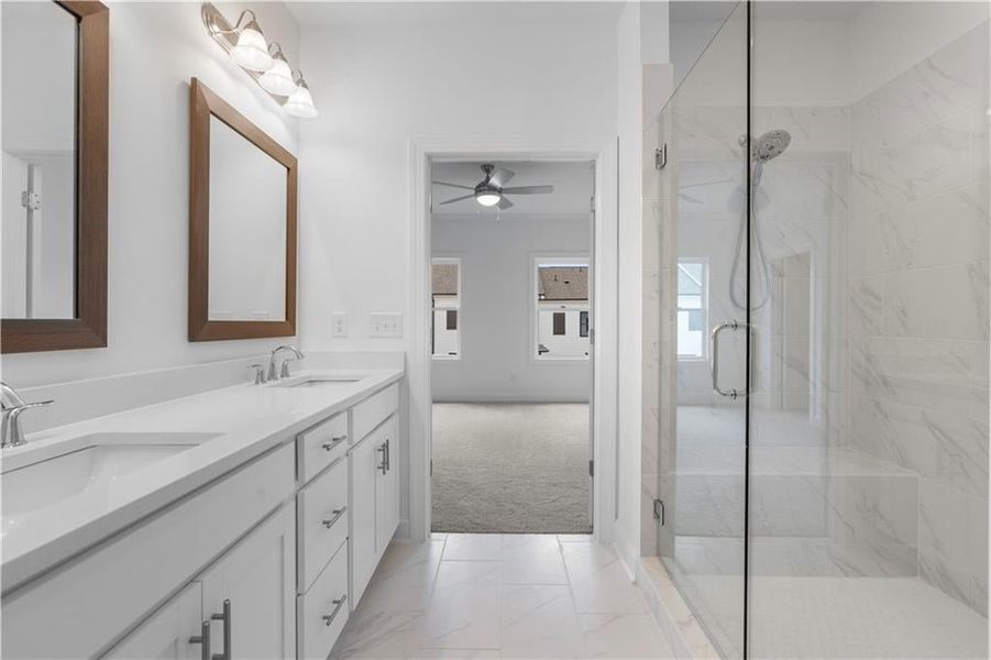 primary bathroom is simply lovely - *Pictures represent a previously built home, not the actual home, home is under construction*