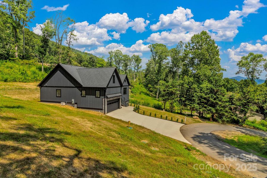 Front exterior of a new home in , Fairview, NC, highlighting curb appeal (Image 25).