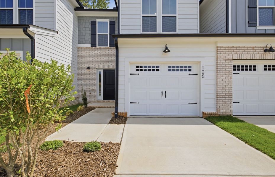 Exterior details and patio area of a home in Cambria, Garner (Image 3).