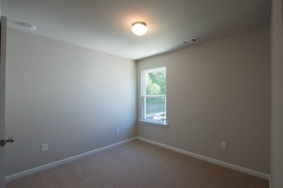 Representative unfurnished interior of a home built from the Laurel by Piedmont Residential in The Reserve at Willow Oaks, Canton (Image 28).