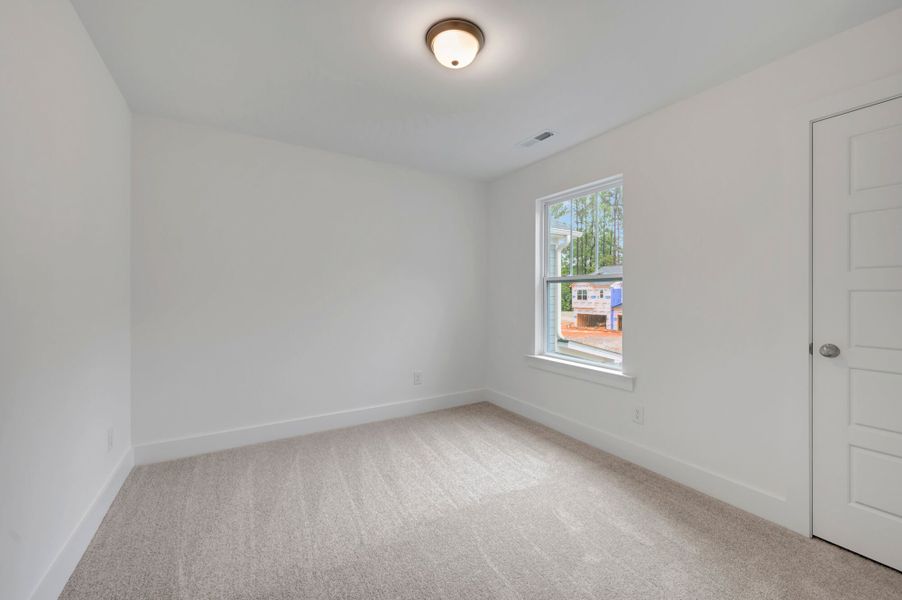 Spacious, unfurnished interior of a new home in Ashmore Townes, Garner (Image 32). Spacious, unfurnished interior of a new home in Ashmore Townes, Garner (Image 32).