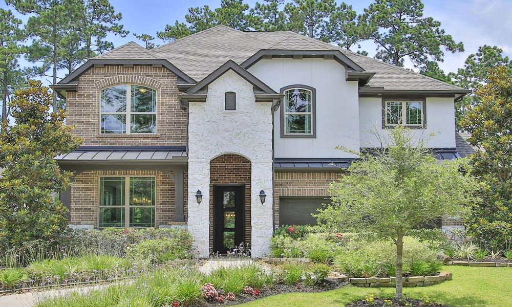 Representative exterior photo of a completed home built from the Premier Series - Magnolia by Brightland Homes in Anthem, Kyle, TX (Image 28). Representative exterior photo of a completed home built from the Premier Series - Magnolia by Brightland Homes in Anthem, Kyle, TX (Image 28).